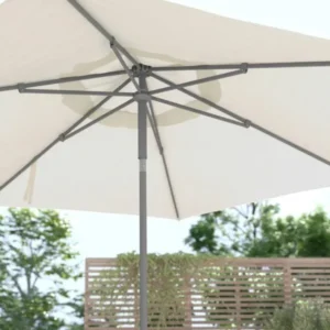 White outdoor umbrella providing shade in a Melbourne event setting.